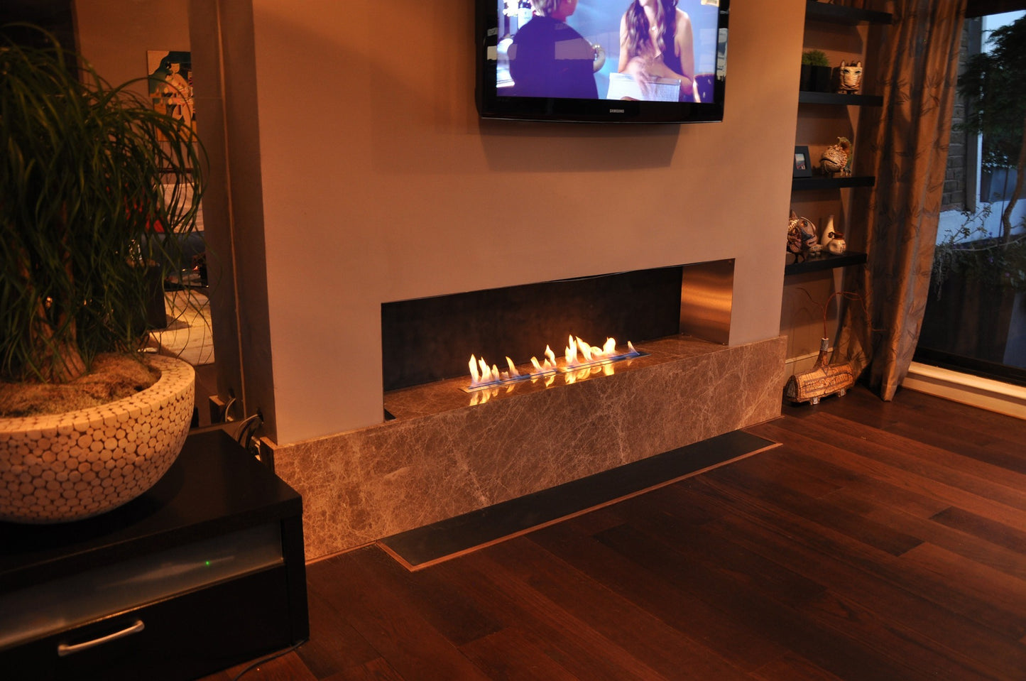 Fireplace with 75 Bio CONTAINER under TV marble base