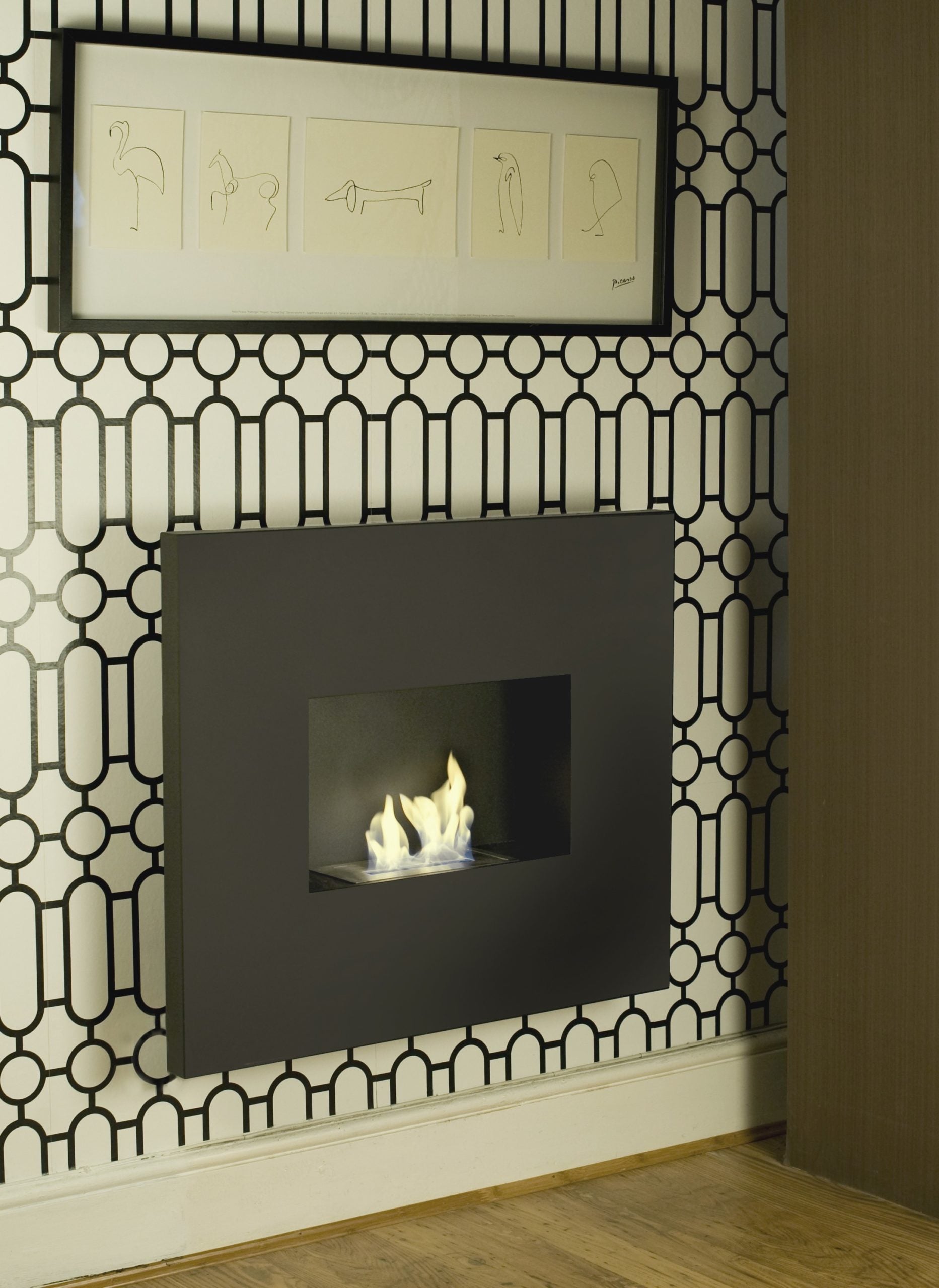 ONYX Black Bioethanol Fireplace hung on decorative wall