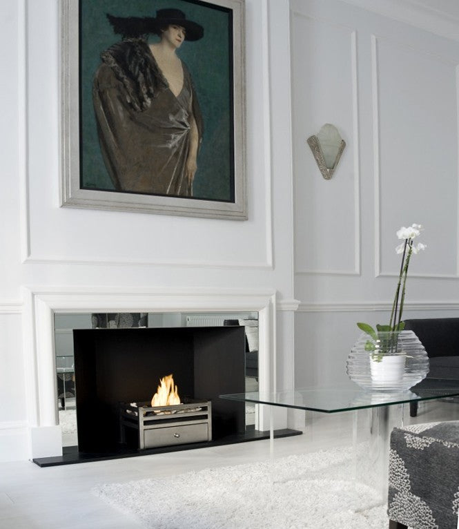 CHELSEA Polished Steel Bioethanol Grate in fireplace opening  with white surroundings