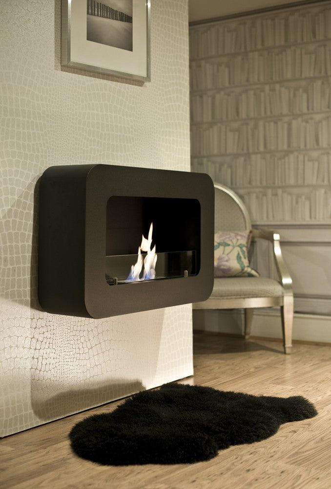 SERENITY Bioethanol Fireplace hung on white decorative wall