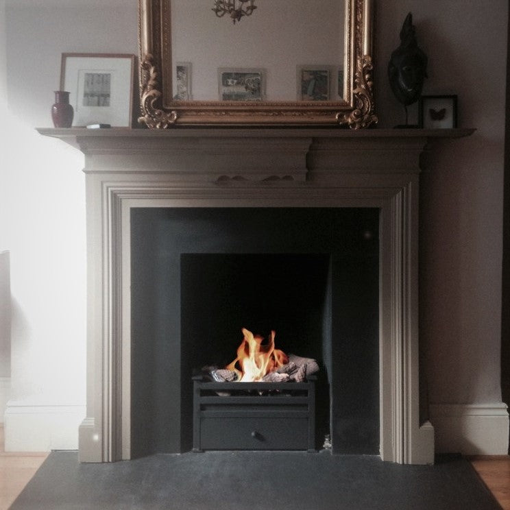 CHELSEA Black Bioethanol Grate in fireplace with white mantelpiece