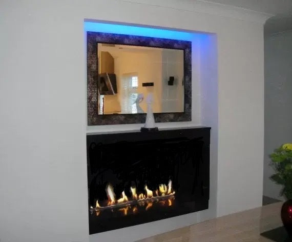 Fireplace with 75 Bio CONTAINER under mirror