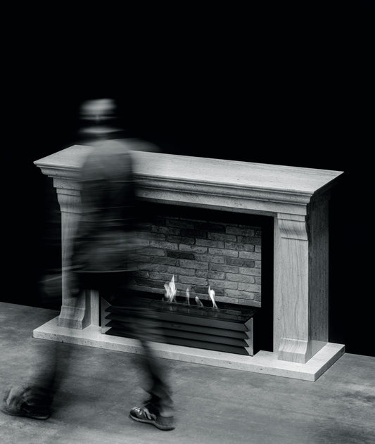 York grate in brick casing and stone mantelpiece black and white picture at human scale