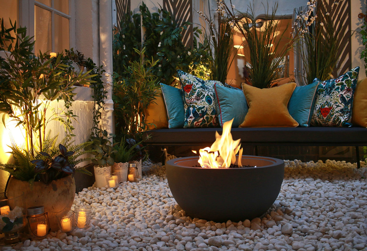 Mini Grey Bioethanol Firepit Outdoor Fireplace in paved garden