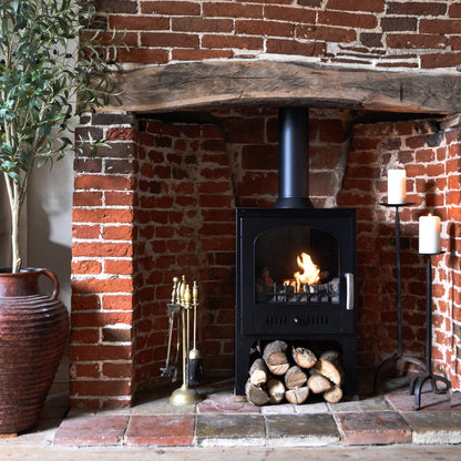 Abingdon Black in old brick chimney between candles and olive tree