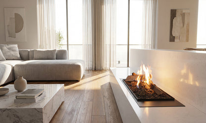 Planika Flogs. Fireplace in white and light grey living room. 