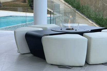 Circus with automated bioethanol burner and white ottomans. Swimming pool in the background.